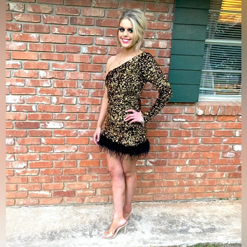 Beautiful Gold sequined mini dress with black boa hem size M